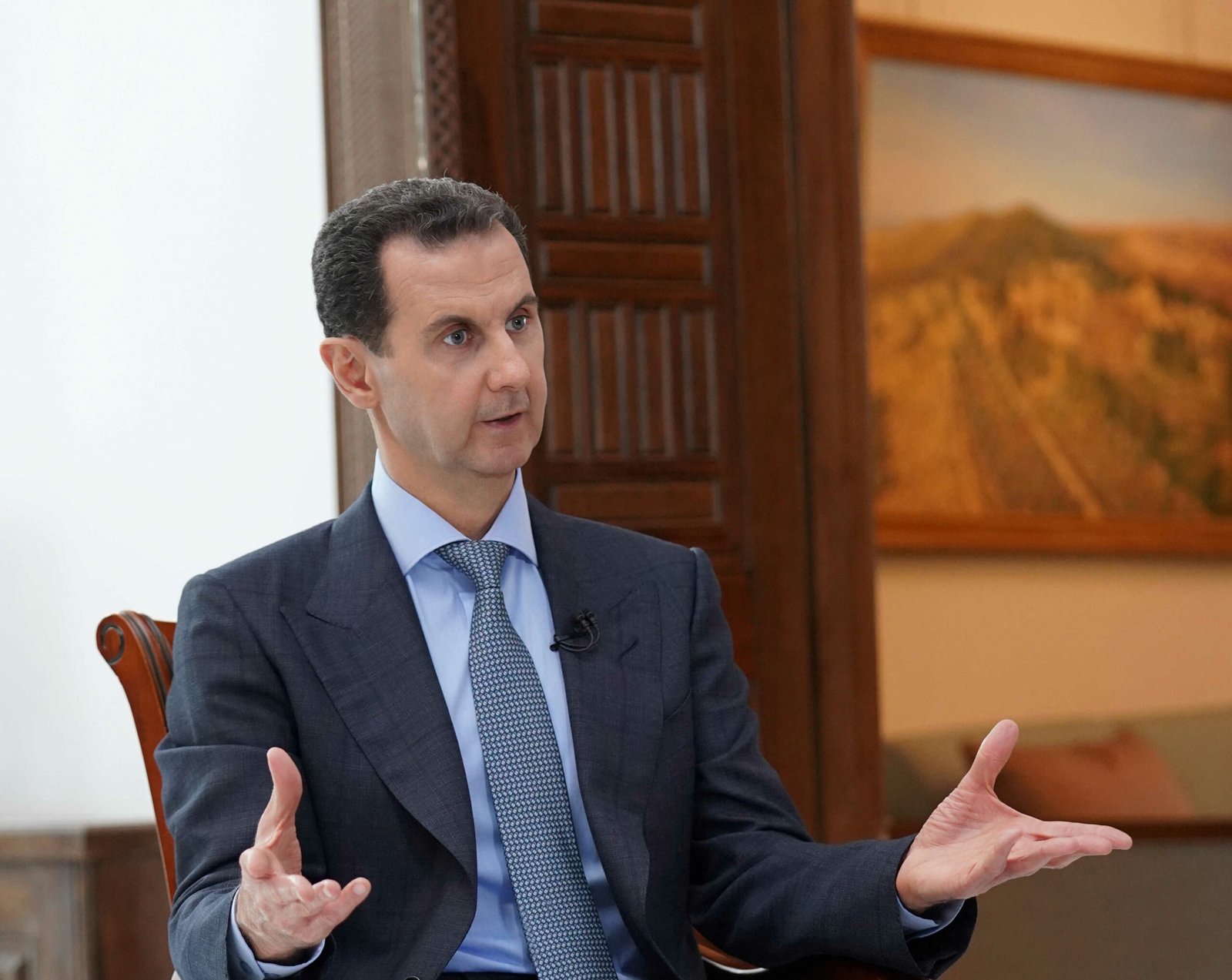 Syria's President Bashar al-Assad speaks during an interview with Russia 24 in Damascus, Syria in this handout released by SANA on March 5, 2020. SANA/Handout via REUTERS ATTENTION EDITORS - THIS IMAGE WAS PROVIDED BY A THIRD PARTY. REUTERS IS UNABLE TO INDEPENDENTLY VERIFY THIS IMAGE