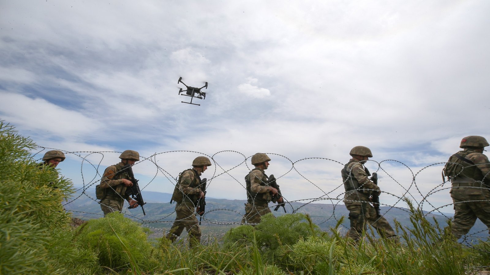AVASHIN BASYAN, IRAQ - MAY 21 : Turkish soldiers patrol the with a drone at northern Iraq's Avashin-Basyan region on May 21, 2018. Turkish military officers on duty at Sera Batin Hill Base with an altitude of 2,550 meters patrol the border and monitor the movements of PKK terrorists to prevent any possible act of terror and provide the security of the border. (Photo by Ozkan Bilgin/Anadolu Agency/Getty Images)