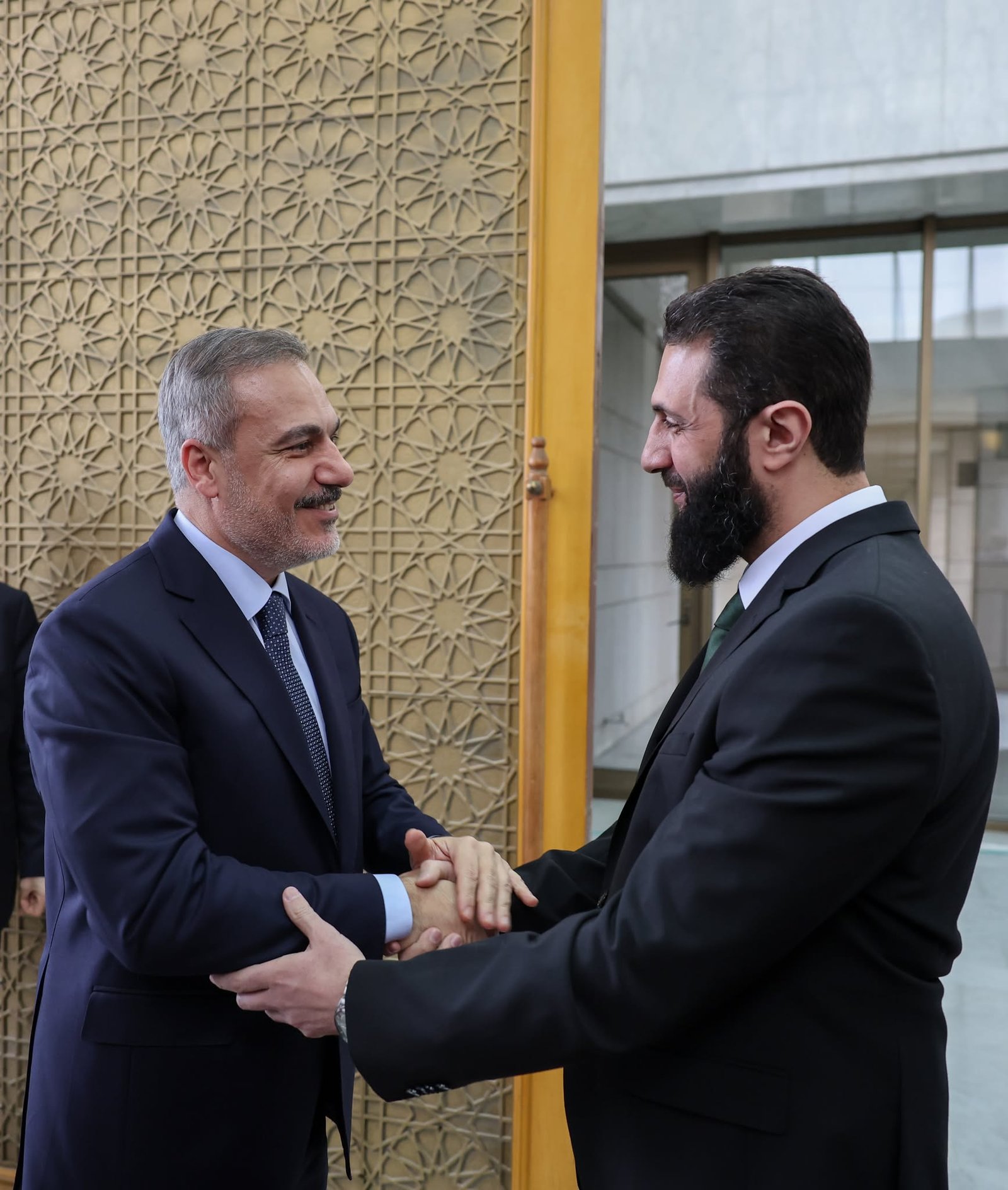 DAMASCUS, SYRIA - DECEMBER 22: Turkish Foreign Minister Hakan Fidan meets the leader of Hayat Tahrir al-Sham (HTS), Abu Mohammad al-Jolani in Damascus, Syria on December 22, 2024. ( Arda Küçükkaya - Anadolu Agency )